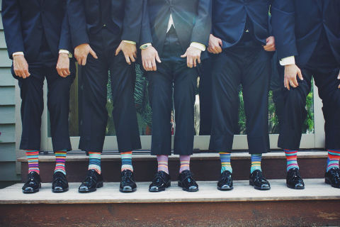 10 ways to spice up your presentation: men in suits showing colourful socks