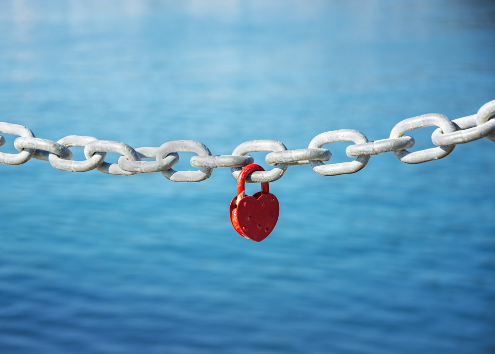 make client relationships better: heart padlock on chain