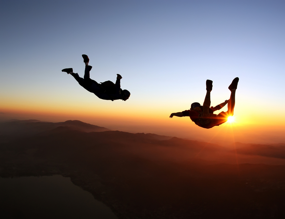 Two parachutists in mid-air: how to manage change in client relationships